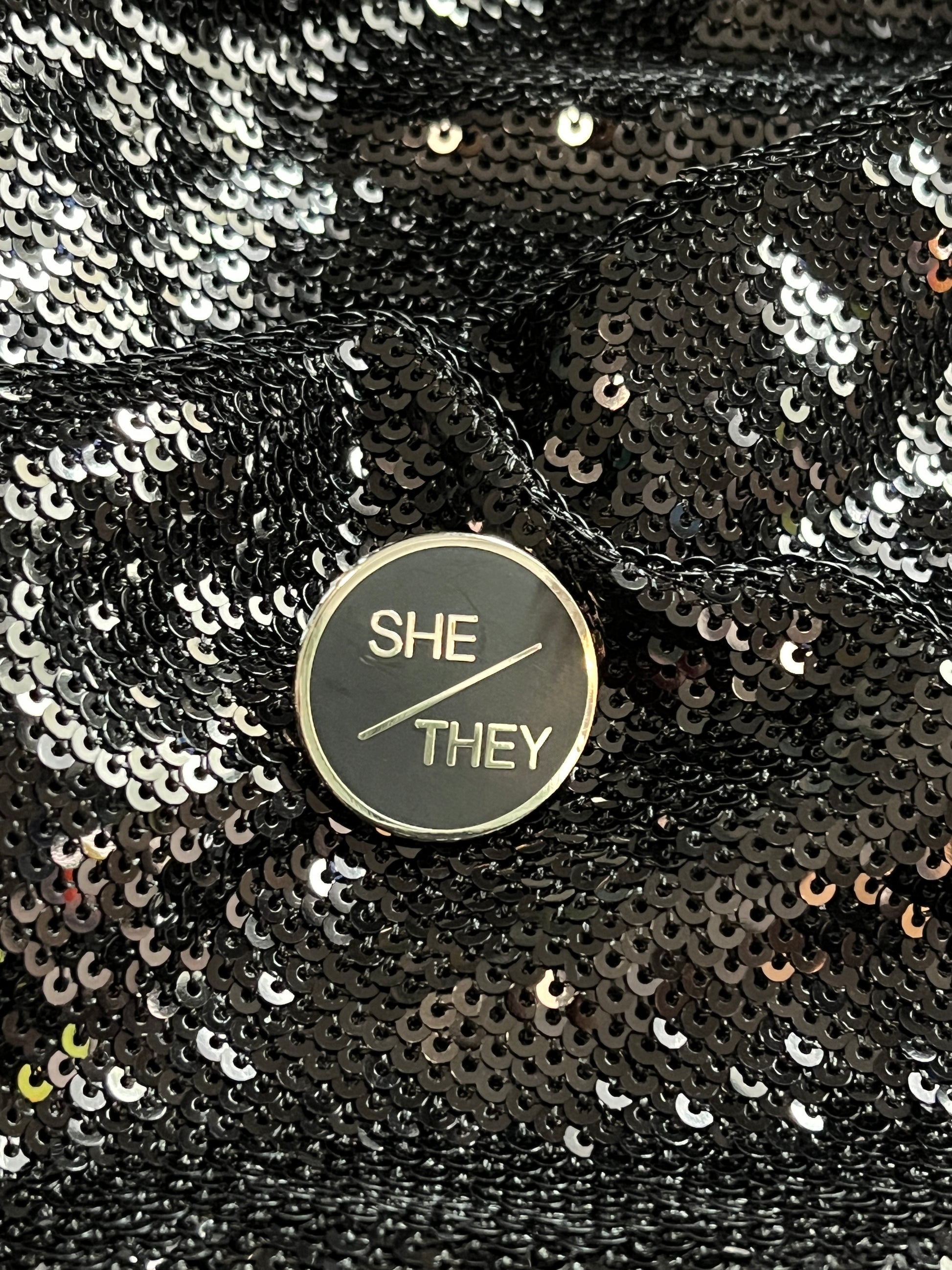 She/They Pronoun Pin – Kink On The Scene